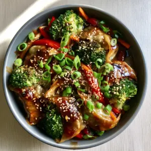 Top-down photo of crockpot pork potstickers in a matte cooker with vibrant broccoli and julienned carrots.